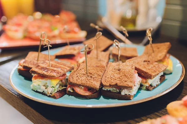 Mini Club Sandwich with chicken beacon ham, Egg Salad Cold Cuts Brioche Sandwiches for Catering, Seminar, Coffee Break, Breakfast, Lunch, Dinner, Buffet and meeting Group.