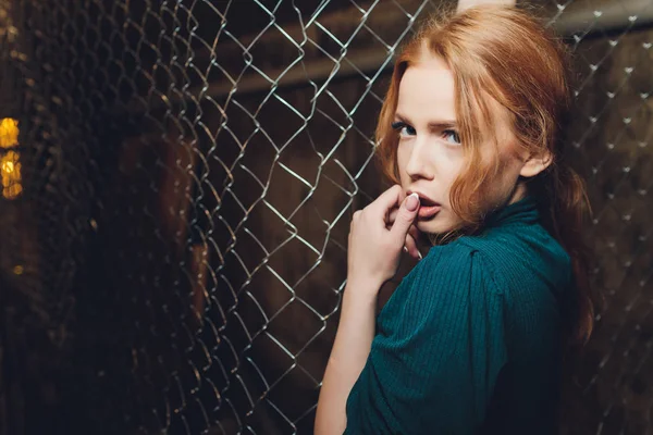 Portrait of a young beautiful freckled redhead. — Stock Photo, Image