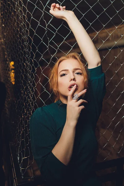 Portrait of a young beautiful freckled redhead. — Stock Photo, Image