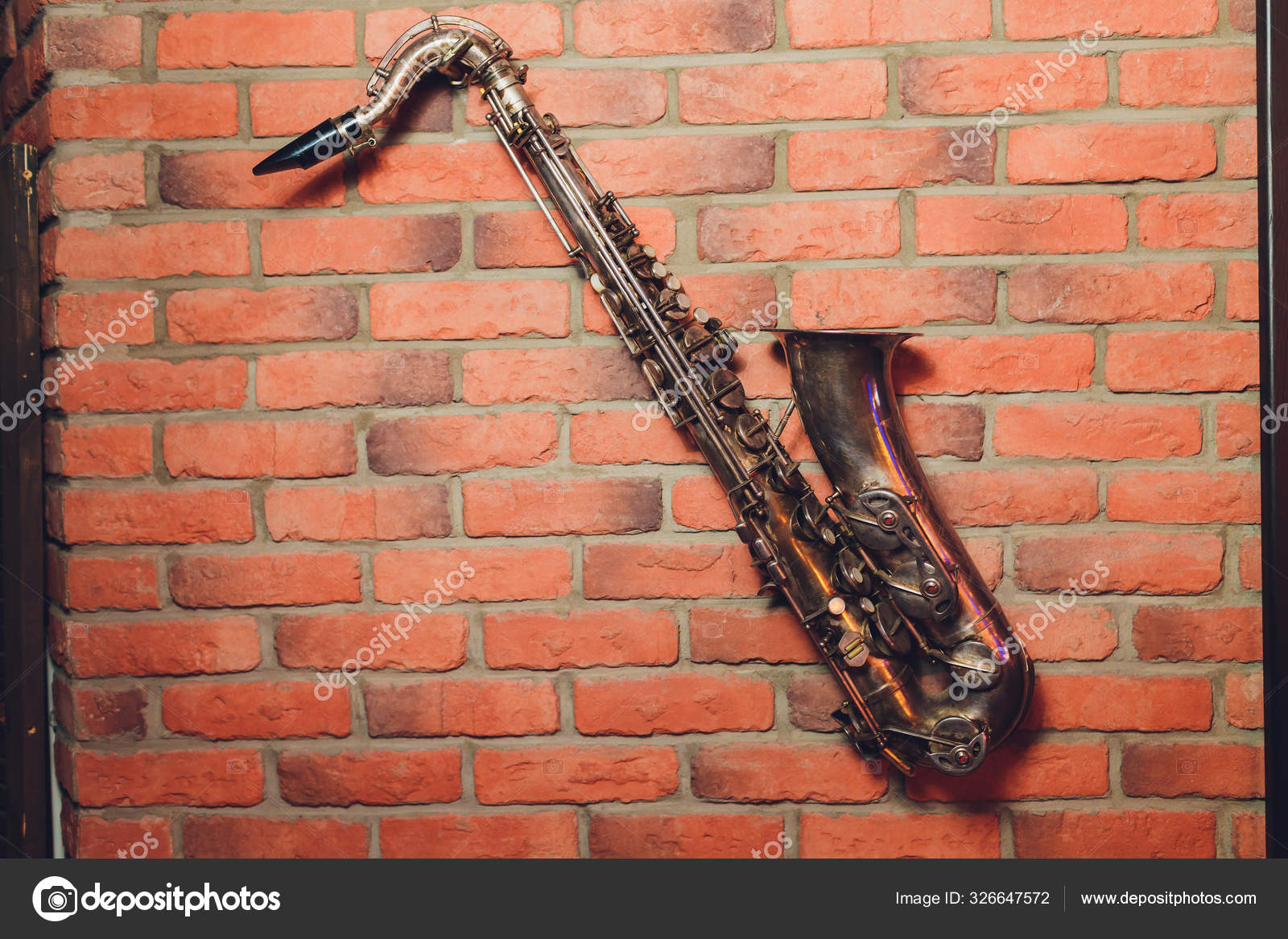 Saxophone classical music instrument Saxophonist with alto sax closeup