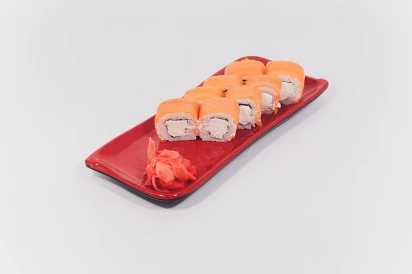 Großes buntes Sushi-Set. isoliert auf weißem Hintergrund. — Stockfoto