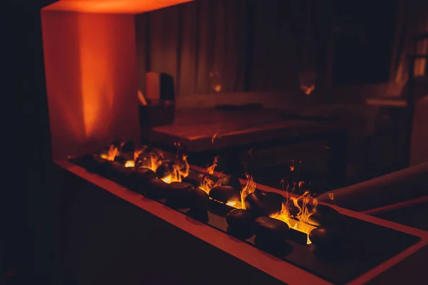 Artificial electronic fireplace . Close-up open room a restaurant. — Stock Photo, Image