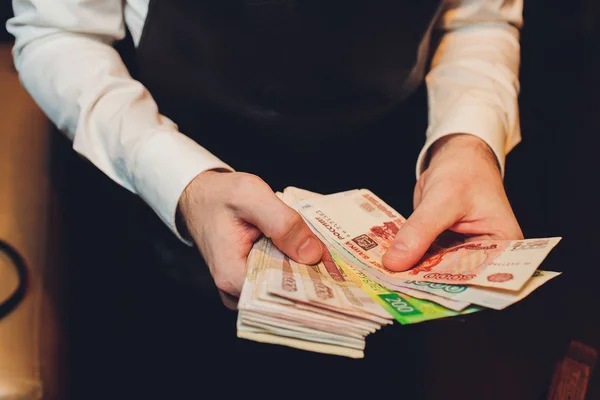 Russian rubles in the hands of a business woman. — Stock Photo, Image