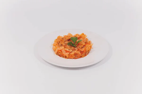 Homemade sauerkraut. Fermented food. Sauerkraut with carrots in a bowl on a concrete white background. Top view, flat lay. Copy space. — Stock Photo, Image