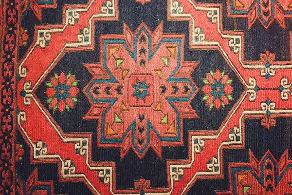 Orientalne ręcznie robione wełniane tło dywanu, stara faktura. — Zdjęcie stockowe