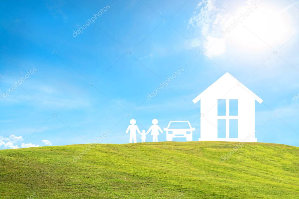 home car family on green grass and blue sky. concept assurance 