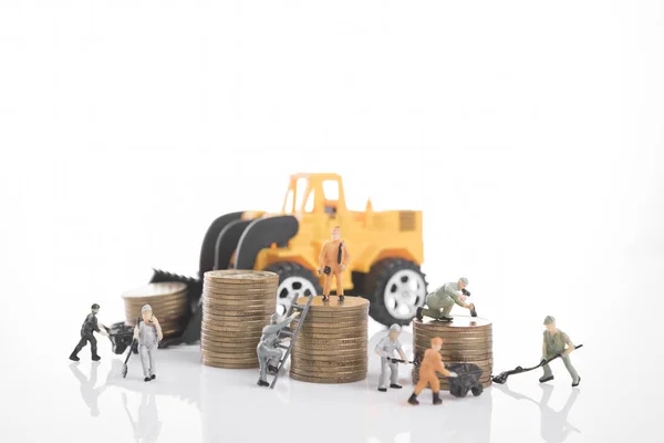 Miniature people workers on money coin piles. business investment — Stock Photo, Image