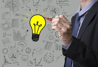 İş el ampul ile grafik çizimi. yeni fikir kavramı