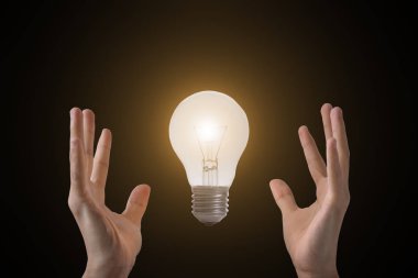 El tutma ampul. kavram umut ve yenilik, fikir.