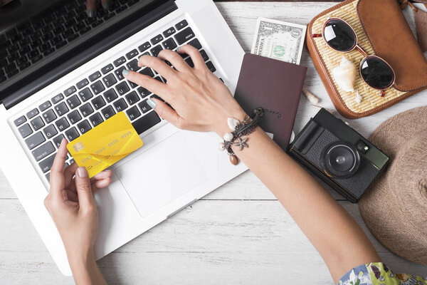 Summer holiday, hand people holding credit card online booking 