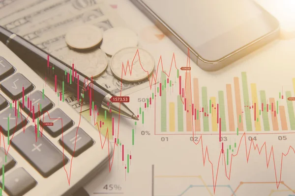 pen, calculator, money, graph concept for business finance.