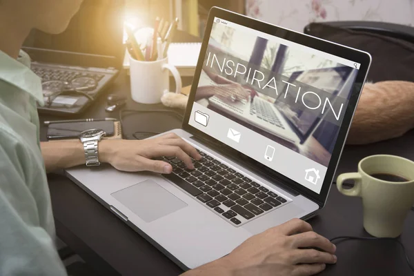 Business hand typing on a laptop keyboard with Inspiration — Stock Photo, Image