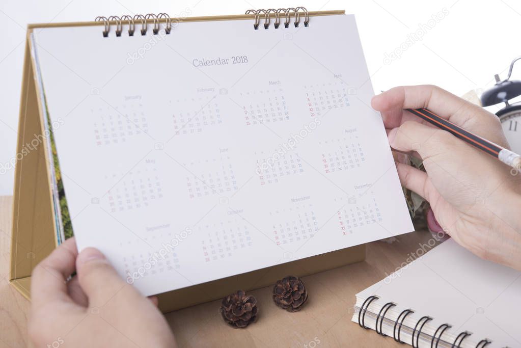 business hand list Calendar 2018 Planner meeting on desk office.