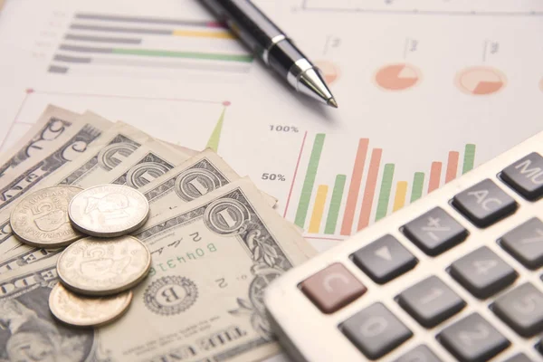 pen, calculator, money, graph stock concept for business finance
