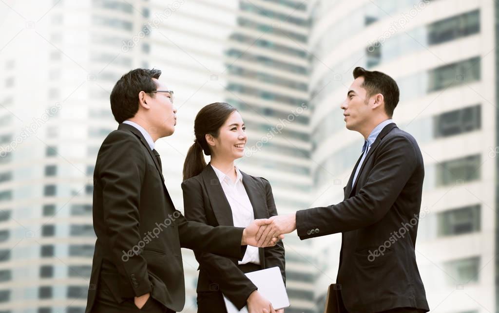 Businessmen making handshake agreement. 