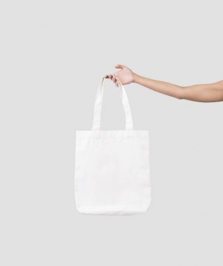 el çantası kanvas kumaş mockup boş şablon izole için tutarak