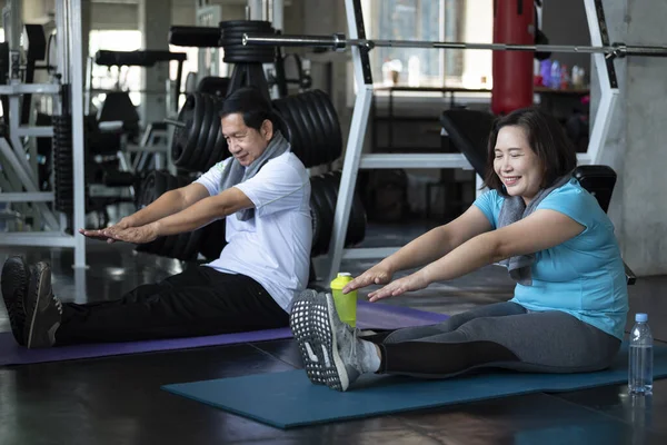 Group of friend asian senior stretching exercise at yoga gym.  elderly healthy lifestyle. — Stock Photo, Image