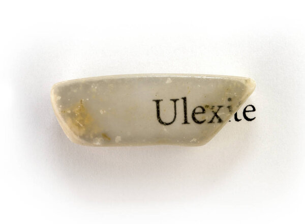 Unusual mineral ulexite or TV rock mineral on white 