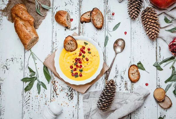 Pumpkin Cream Soup Toasted Bread Pomegranate Seeds Spices Shabby White — Stock Photo, Image