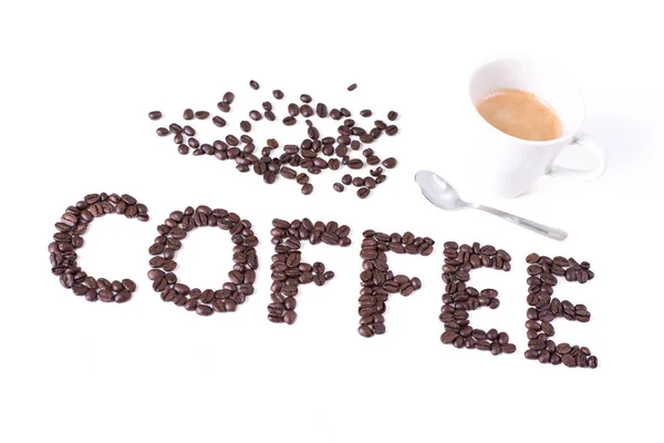 Café fundo, inscrição de grãos de café torrados, xícara de café — Fotografia de Stock