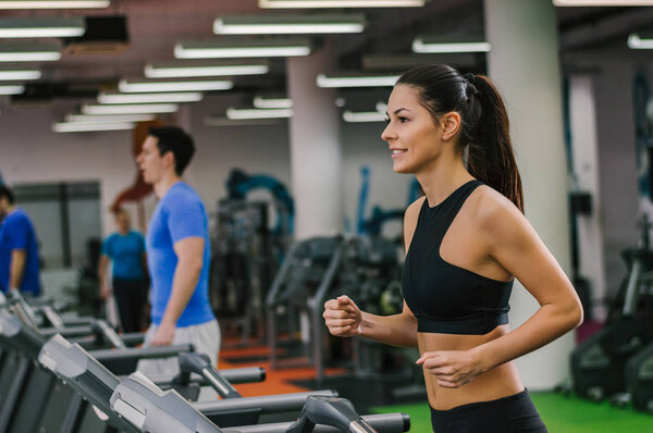 People walking on treadmills  