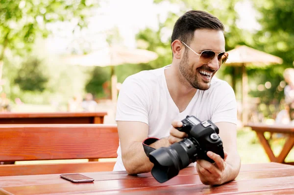 Man sitting in street cafe — Stock Photo, Image