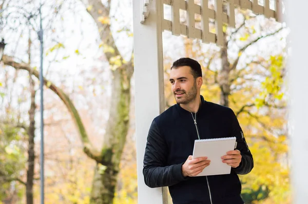 Man writing journal