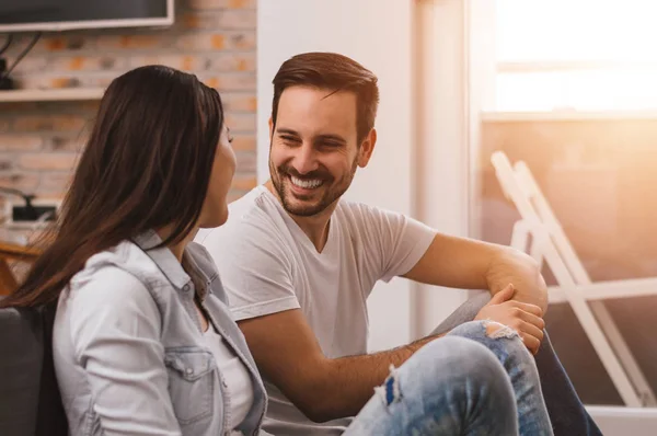 Couple sitting on floor — Stock Photo, Image