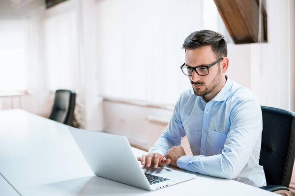 Businessman working with laptop 