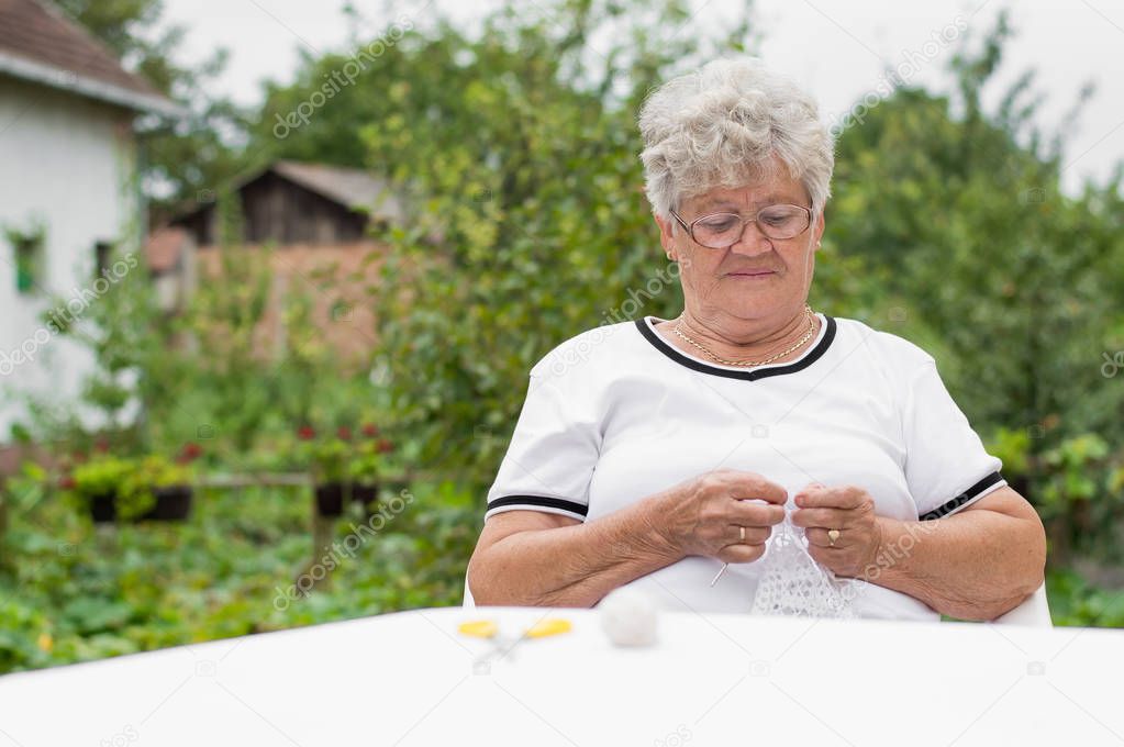 Beautiful  grandma knitting 