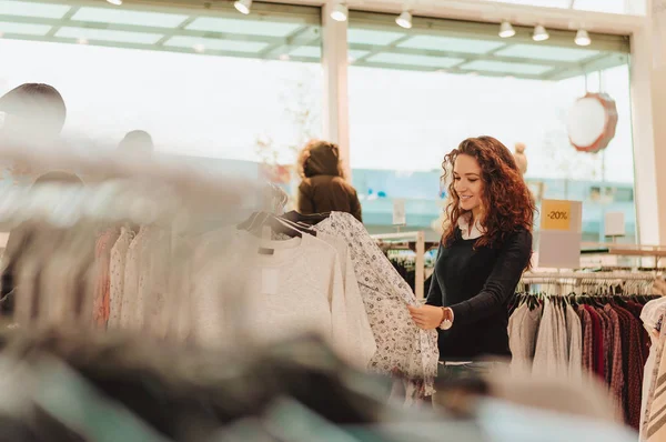 woman shopping for clothes.