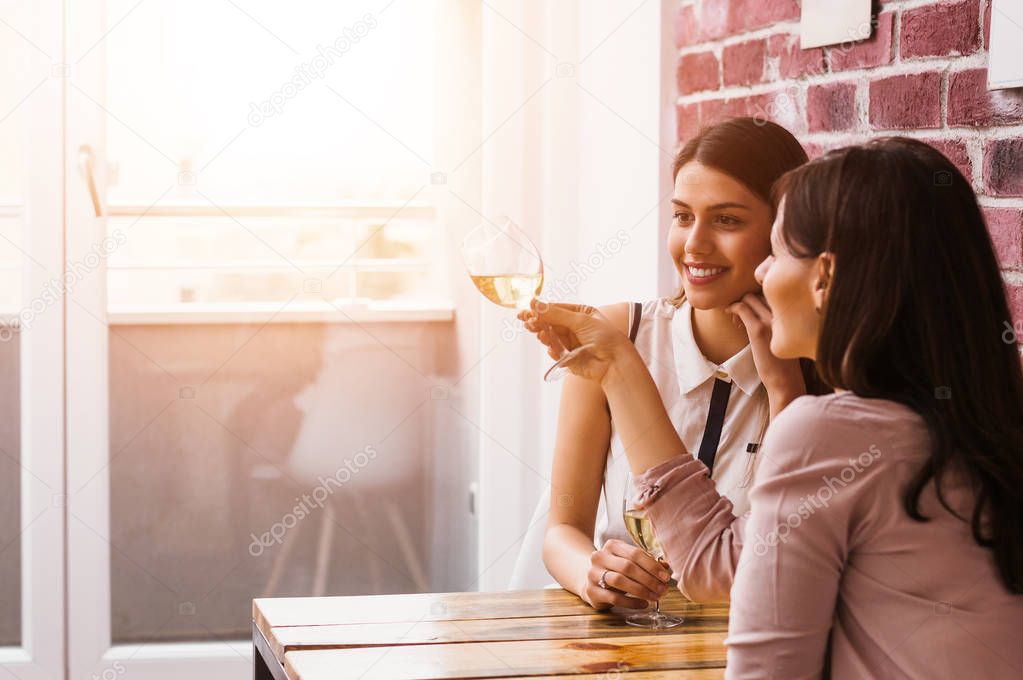 Two women enjoying drinking