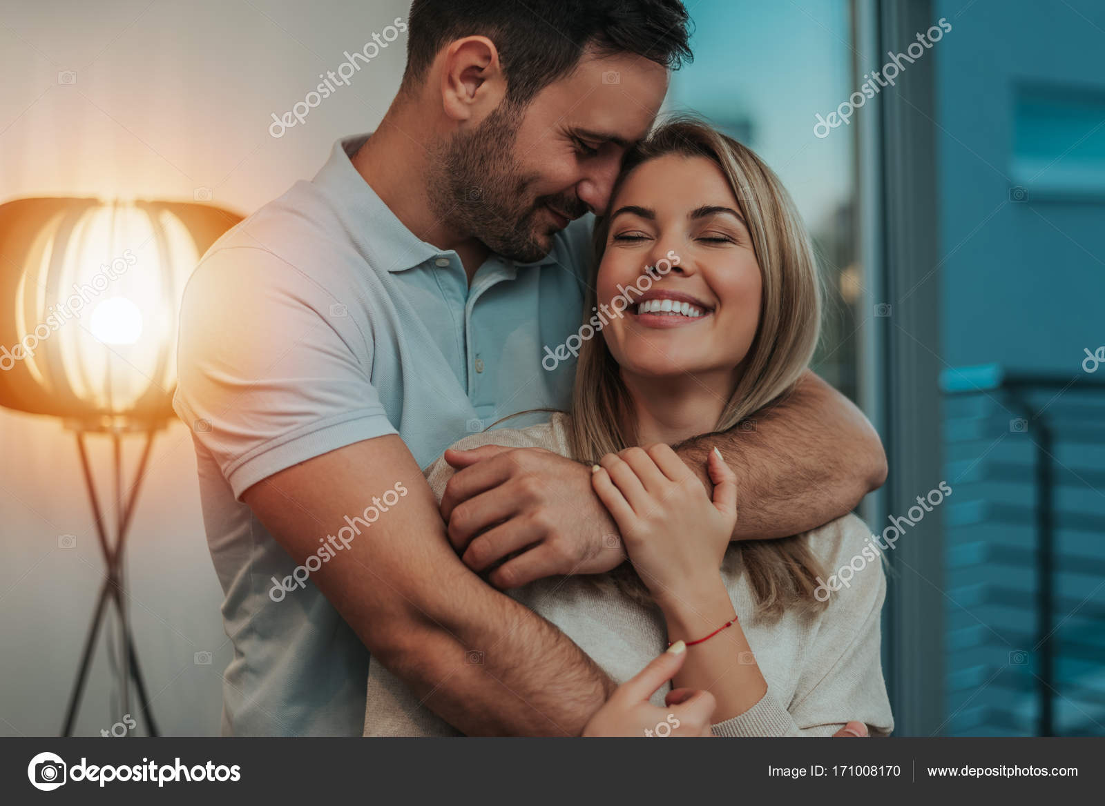 Cute couple hugging and smiling Stock Photo by ©bnenin 171008170