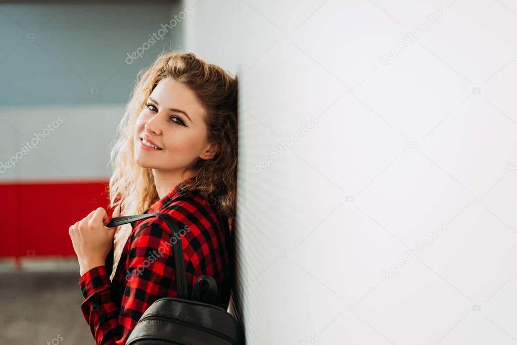 Young beautiful woman with backpack