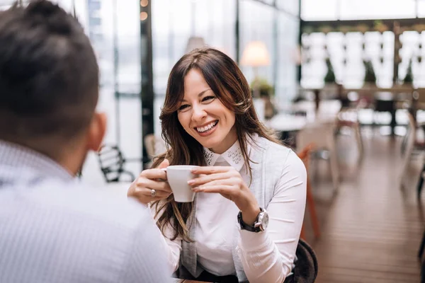 Woman sharing the news with her friend — Stock Photo, Image