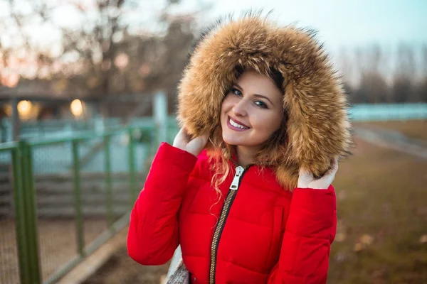 stock image Portrait of beautiful girl wearing winter fur jacket with hoodie