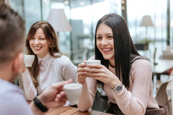 Group of friends having coffee together — Stock Photo, Image