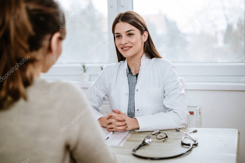 doctor consulting her patient