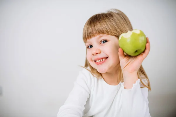 Portrait Little Girl Holding Green Apple Royalty Free Stock Photos