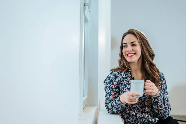 Young Woman Sitting Window Having Hot Drink Daydreaming — Stock Photo, Image