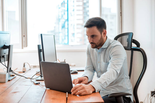 Designer working in the modern office.