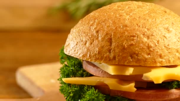 Appetizing Sandwich Prepared Cutting Board Bun Salad Parsley Sausage Cheese — Stock Video