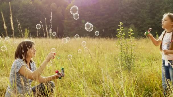 Happy Family Playing Nature Mom Children Blowing Bubbles Girl Boy — Stock Video