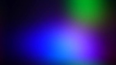 Kırmızı, mavi ve yeşil renklerin aydınlanması. Çok renkli dokular. Siyah arkaplanda hafif müzik. 
