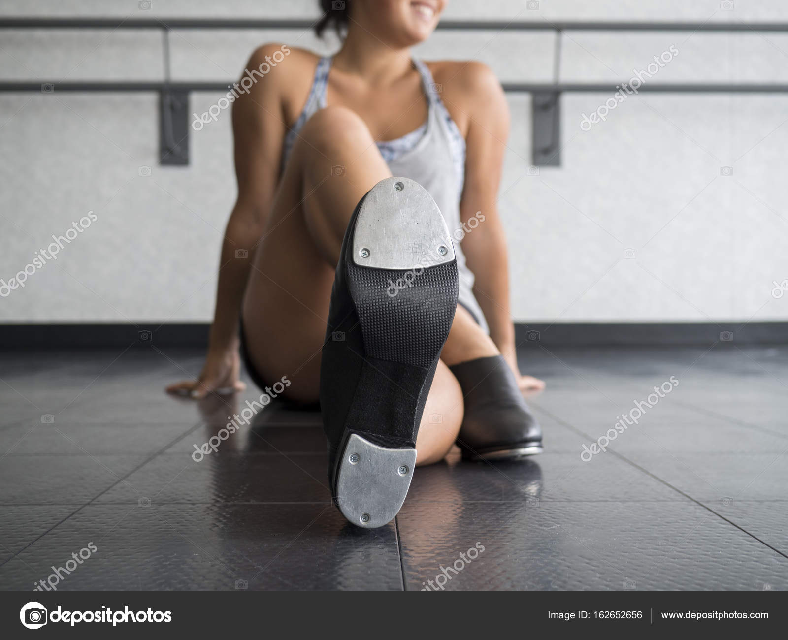 Dancer Sitting Crossed Legged Dance Studio Showing Her Taps Stock Photo by  ©kbycphotography 162652656