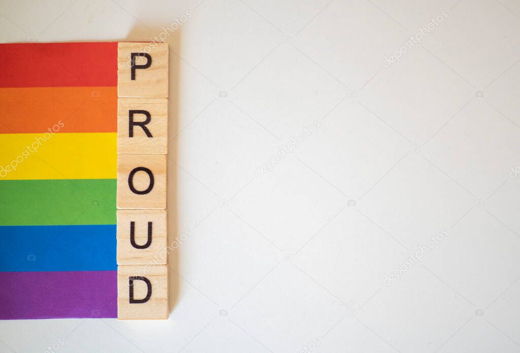 Being Proud LGBTQ+ rainbow flag on a white background 