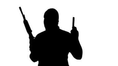 Makineli Tüfek ve Siluet 1 ile Komando veya Terörist