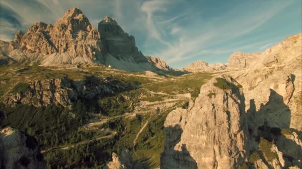 Aerial view of Tre Cime mountains in Dolomites on sunny summer day — Stock Video