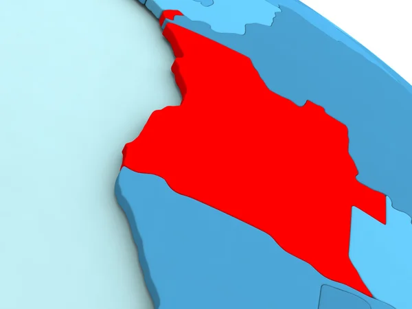 Angola em vermelho no globo azul — Fotografia de Stock
