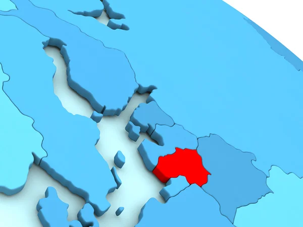 Litauen i rött på blå jordglob — Stockfoto